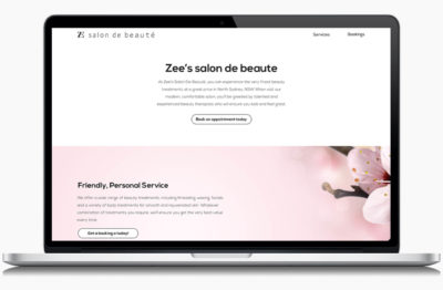 Zee's Salon De Beaute designed website on a laptop